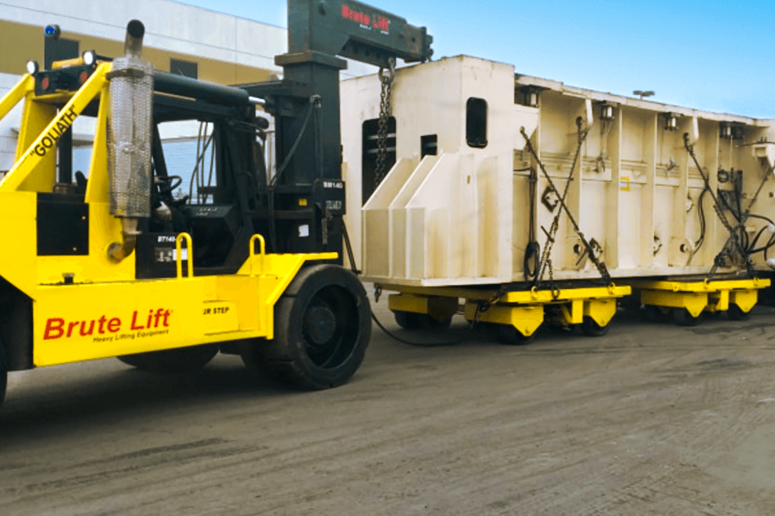 GaleríaTransfer maneuver with 1,500 ton press base die carts.
